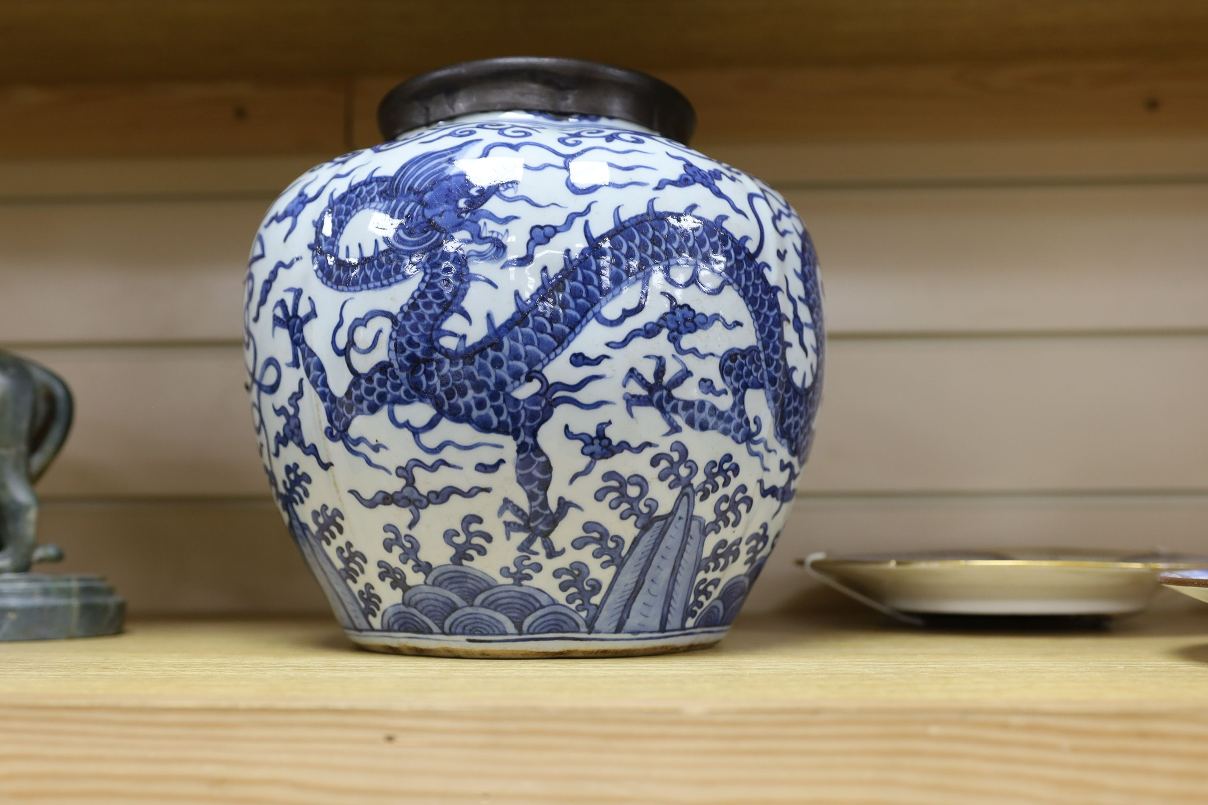A Chinese blue and white ‘dragon jar, Wanli mark and possibly of the period, 23 cm high